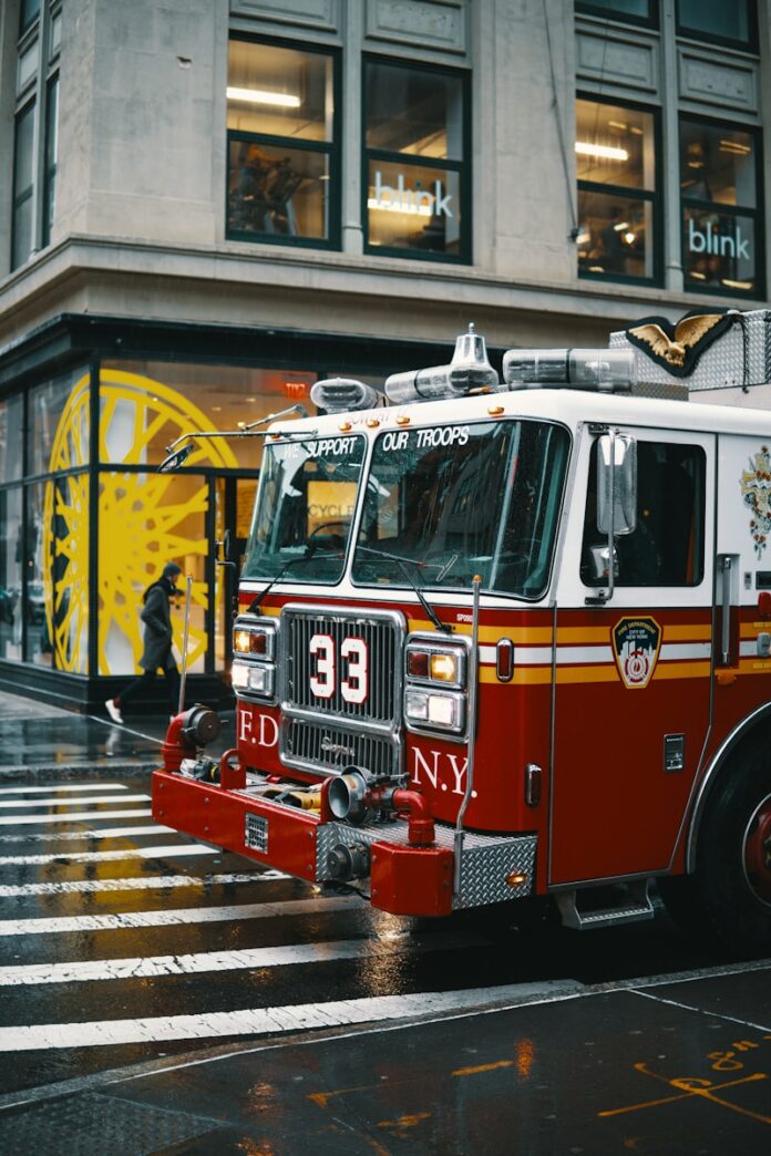 Photo by Alec Favale shallow focus photo of white and red firetruck