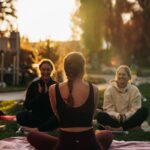 여성 건강, 일상 습관에서 시작하는 작은 변화로 지키자 a group of people sitting on top of a lush green field