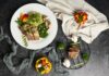 “마음챙김 식사”로 건강한 하루 열기… 소소하지만 확실한 변화 만들기 a white plate topped with meat and veggies